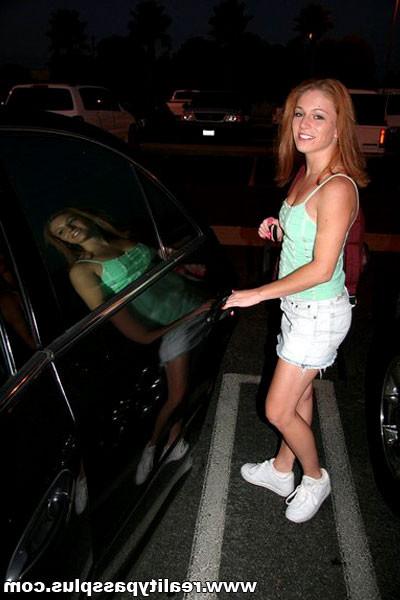 16P Sexy young redhead gets on her knees to suck off a hard reality dick