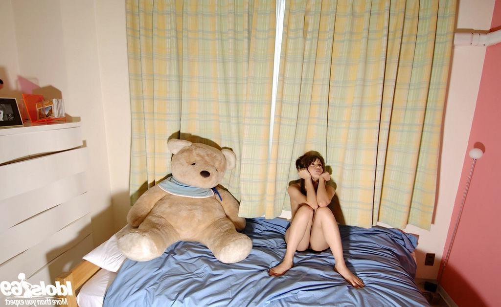 15P Petite Asian drops panties to play with teddy bear