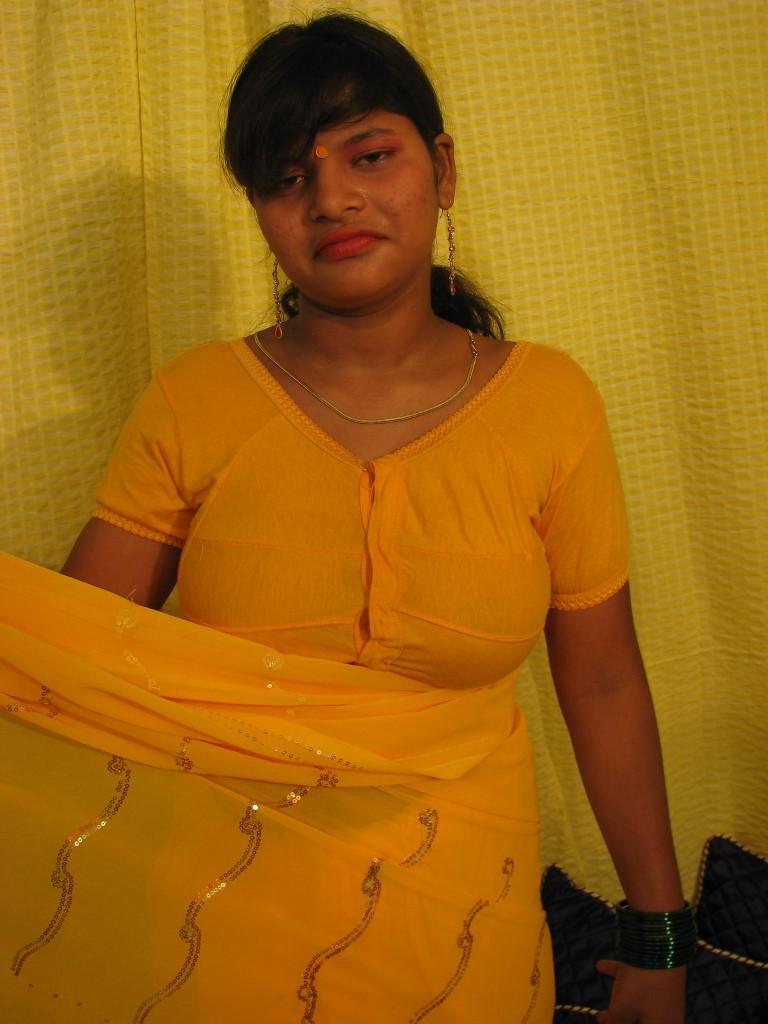 16P Horny desi girl strips and plays with her great natural indian tits