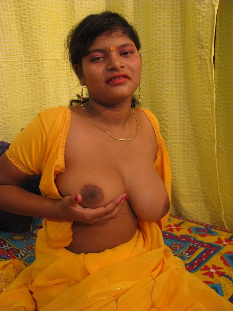 16P Horny desi girl strips and plays with her great natural indian tits