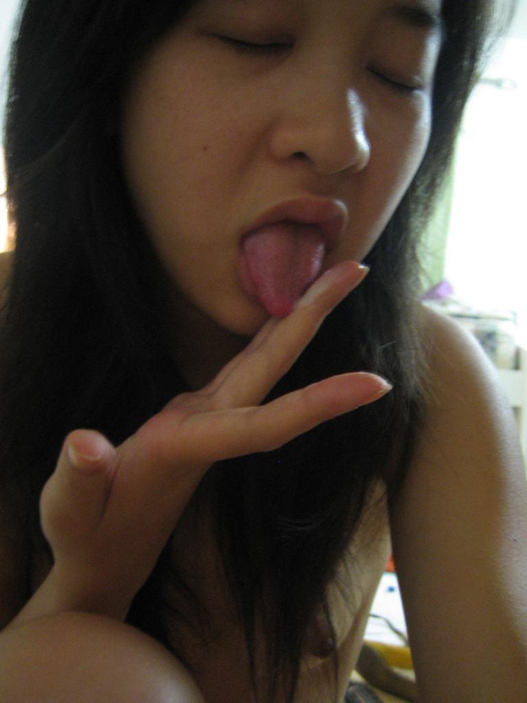 15P Cute Asian teen girlfriend takes homemade pix while toying pussy