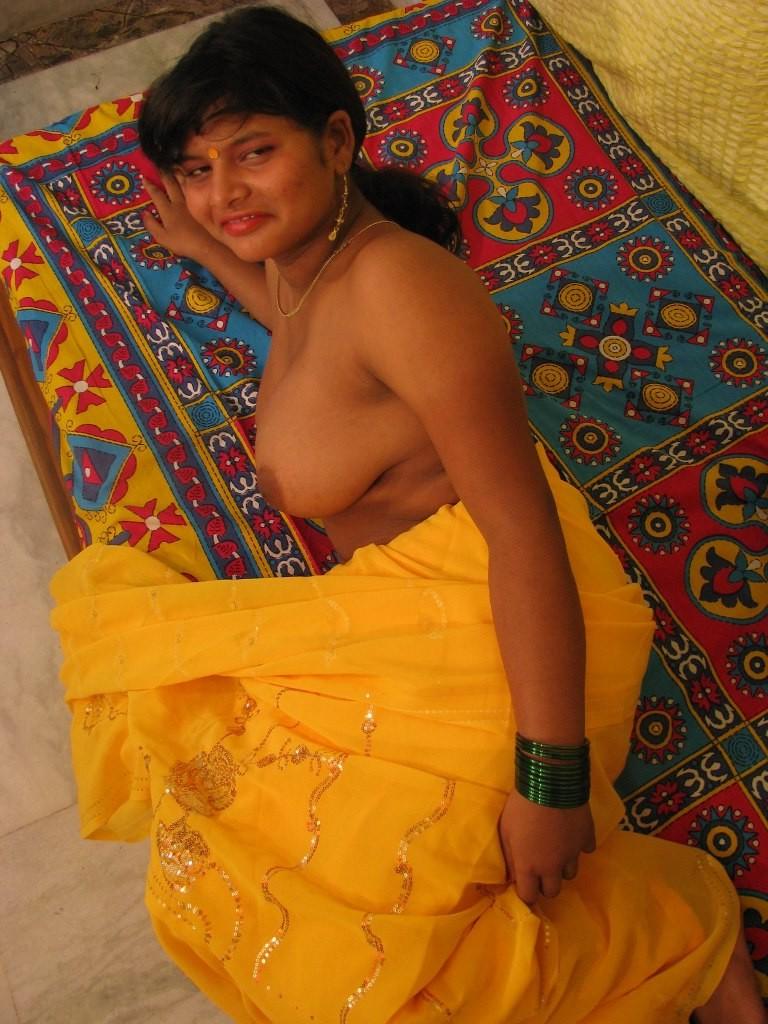 16P Plump desi girl strips naked and plays with her indian big tits