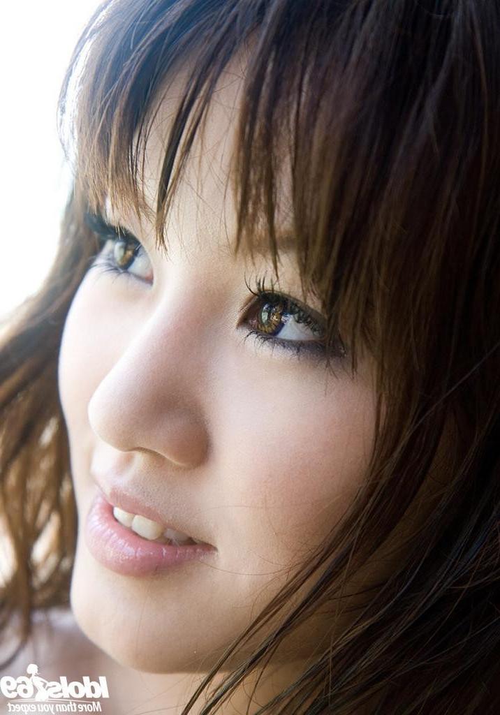 15P Asian plays nude on the sandy beach and in ocean