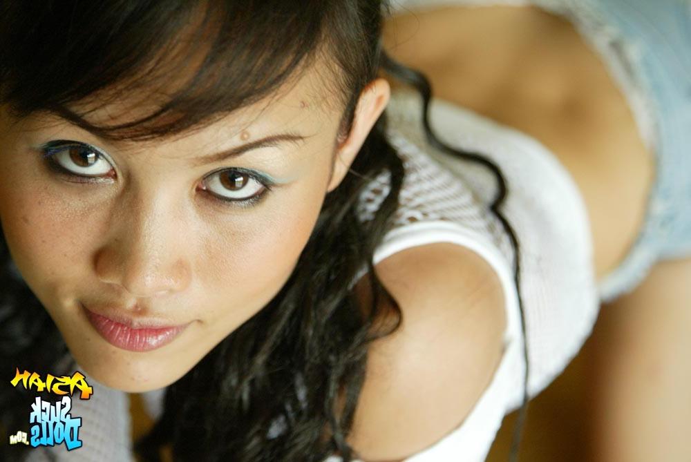 15P Asian chick Nana posing in a see-through top