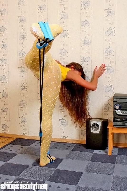 15P Maria in yellow pantyhose working out with stretching expander