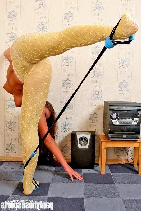 15P Maria in yellow pantyhose working out with stretching expander