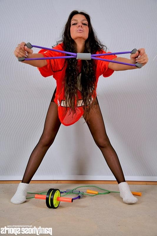 15P Longhaired beauty exercises in black pantyhose
