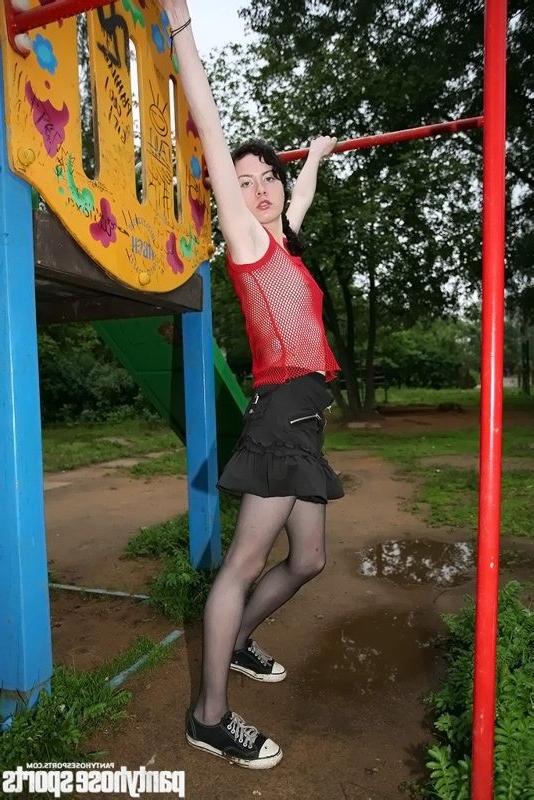 15P Sports missy in black tights exercises outdoors