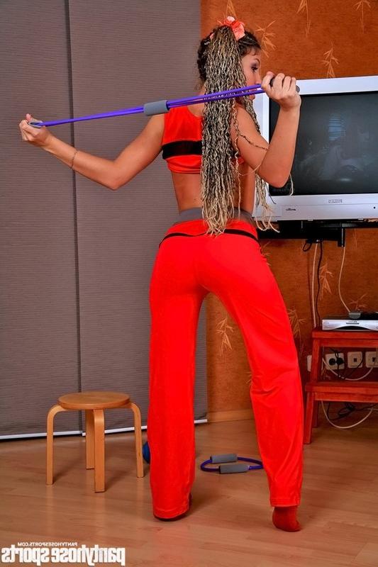 15P Longhaired Adeline does exercises in pantyhose
