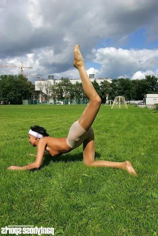 15P Gymnast trains up her legs in pantyhose