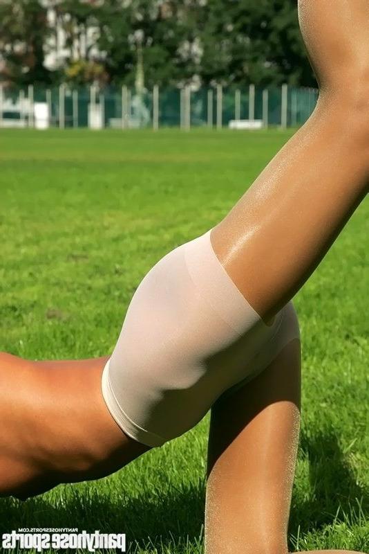 15P Gymnast trains up her legs in pantyhose