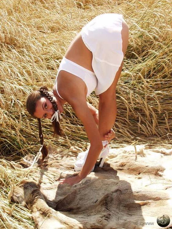16P Flexible brunette teen stretching outdoors