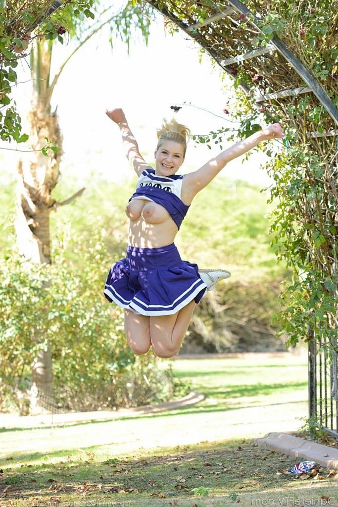 15P Busty cheerleader toys her pussy outdoor in the park