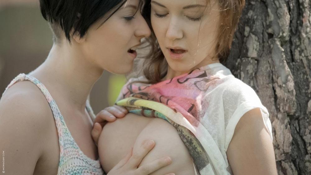 15P Sexy girls lick and tease in the park