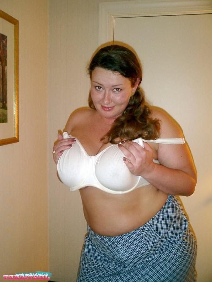 16P Busty fat amateur girl showing her massive boobs and teasing