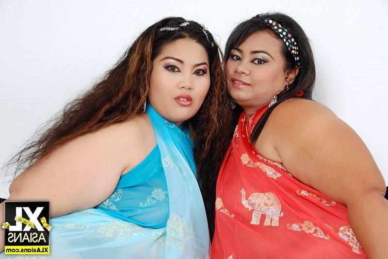 15P Asian BBWs with huge asses kissing in lesbian sex pics