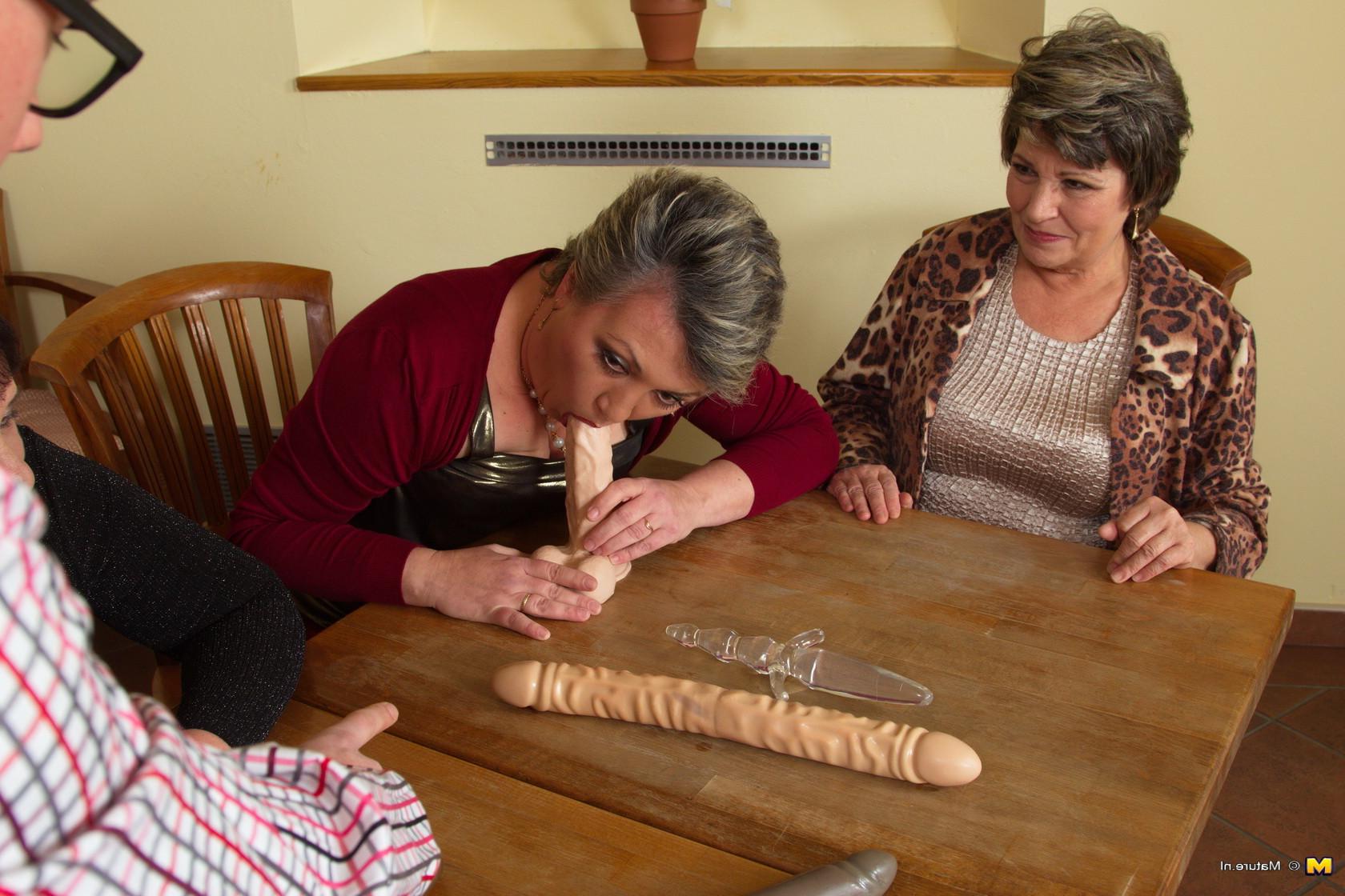 16P Three mature ladies playing around with one lucky guy