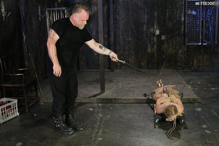 16P Nicki Blue in rope bondage is penetrated and spanked red