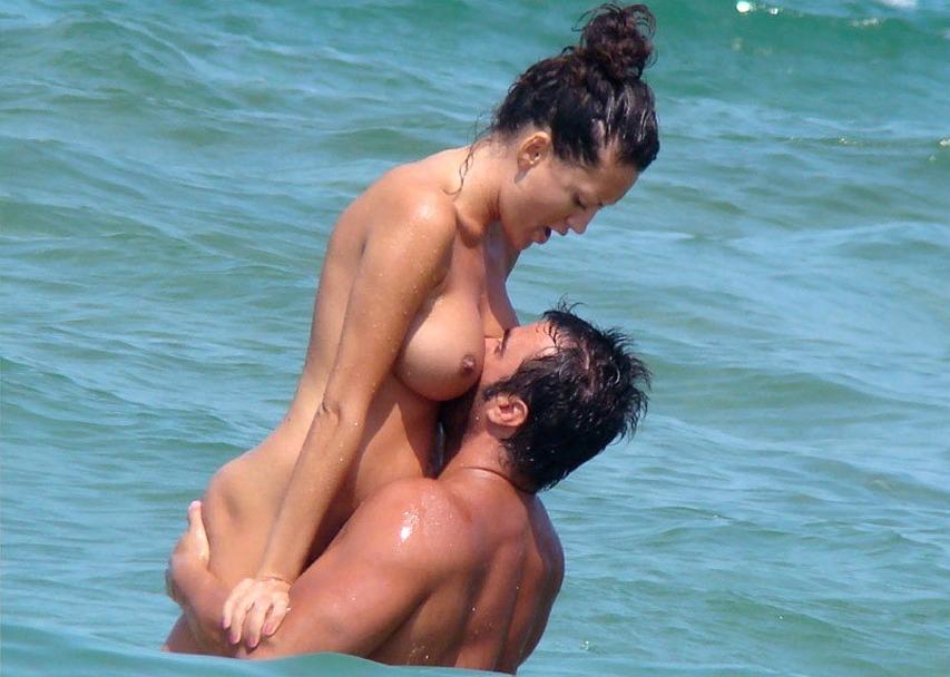 15P Two skinny nudist teens frolic around the beach