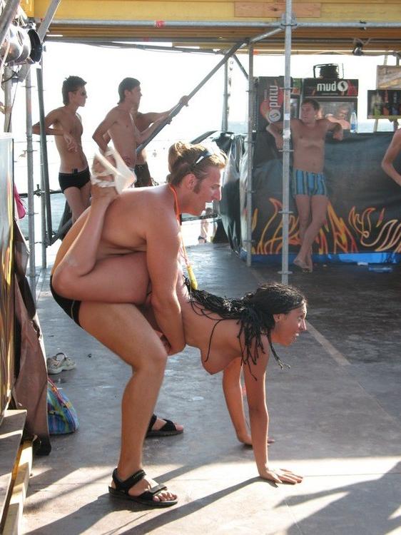 15P At the nudist beach teen girls play around naked