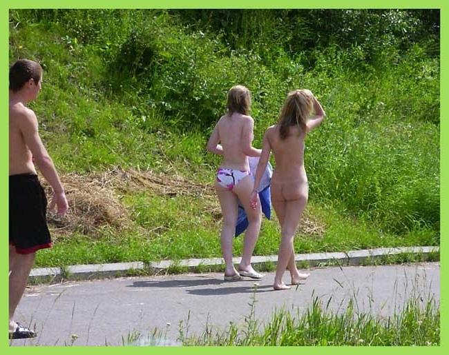 15P Sexy curvaceous cutie strips at a nudist beach