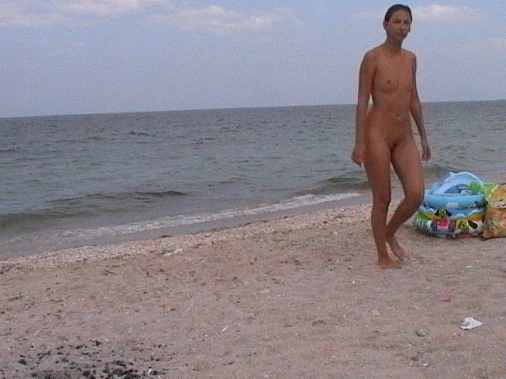 15P Sexy naked teens play together at a public beach