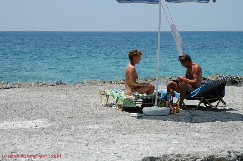 15P A pair of nudist teen friends steam up the beach
