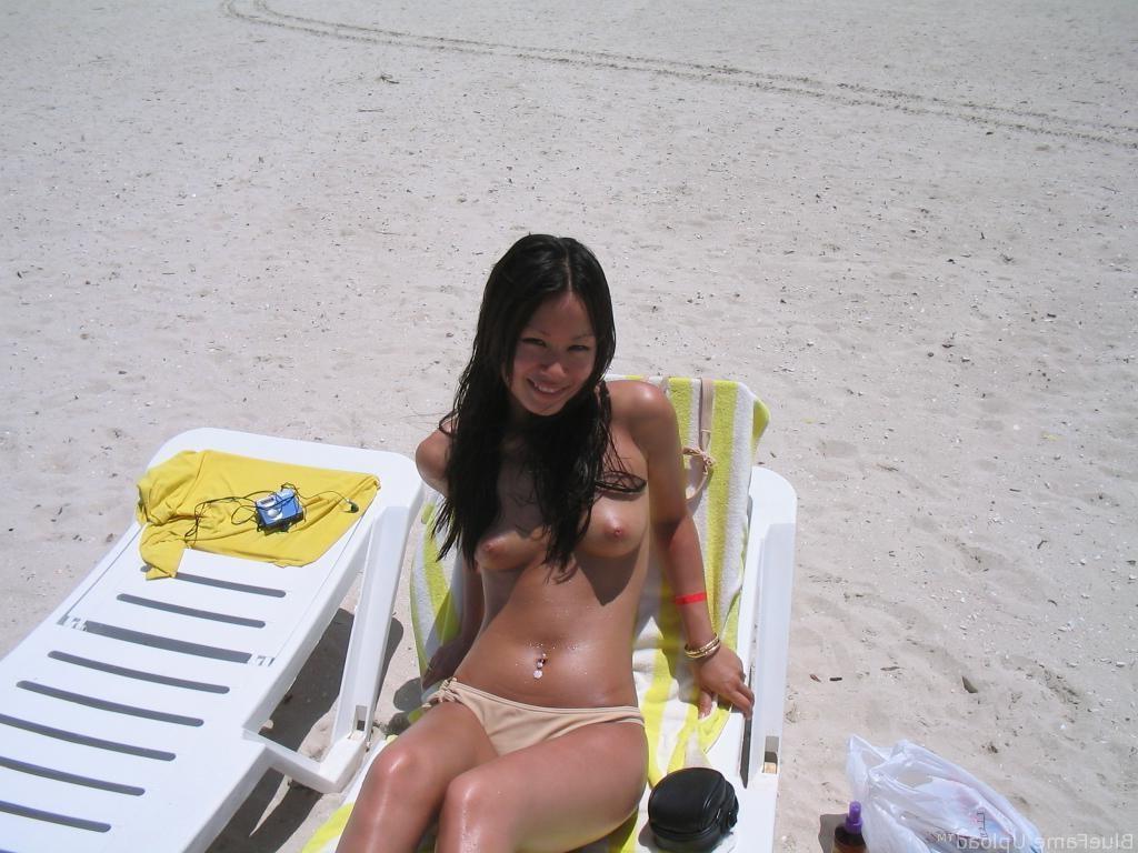 15P Brunette amazes the nude beach with her sexy body