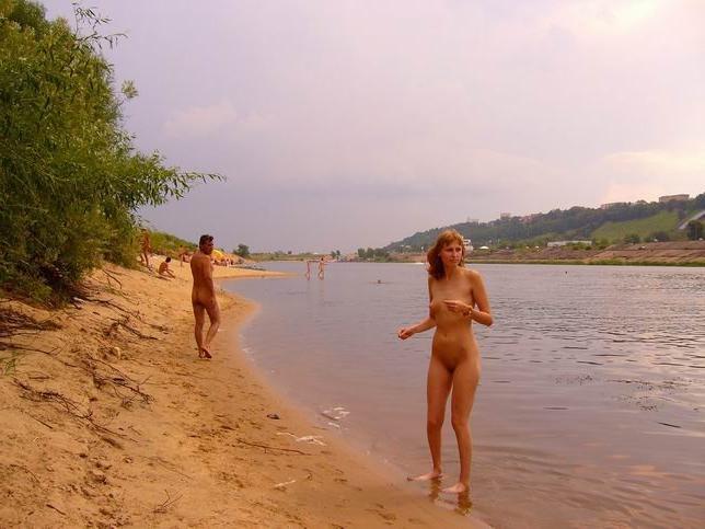 15P Brunette amazes the nude beach with her sexy body