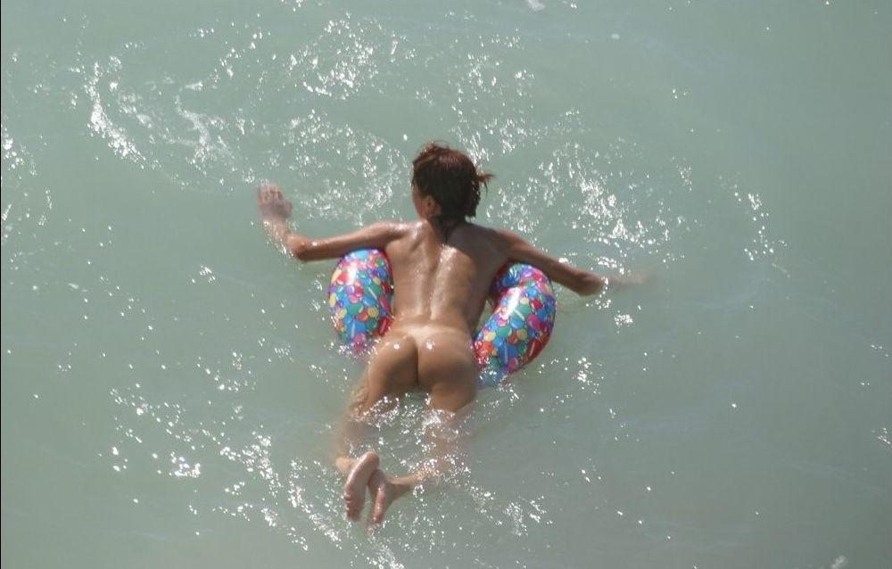 15P A public beach heats up with two hot teen nudists