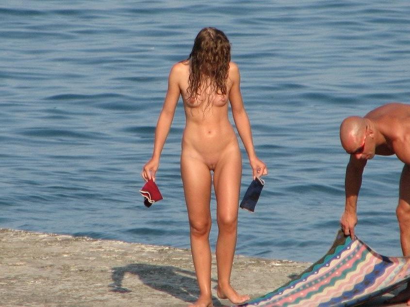 15P Big breasted nude goddess poses on a nude beach