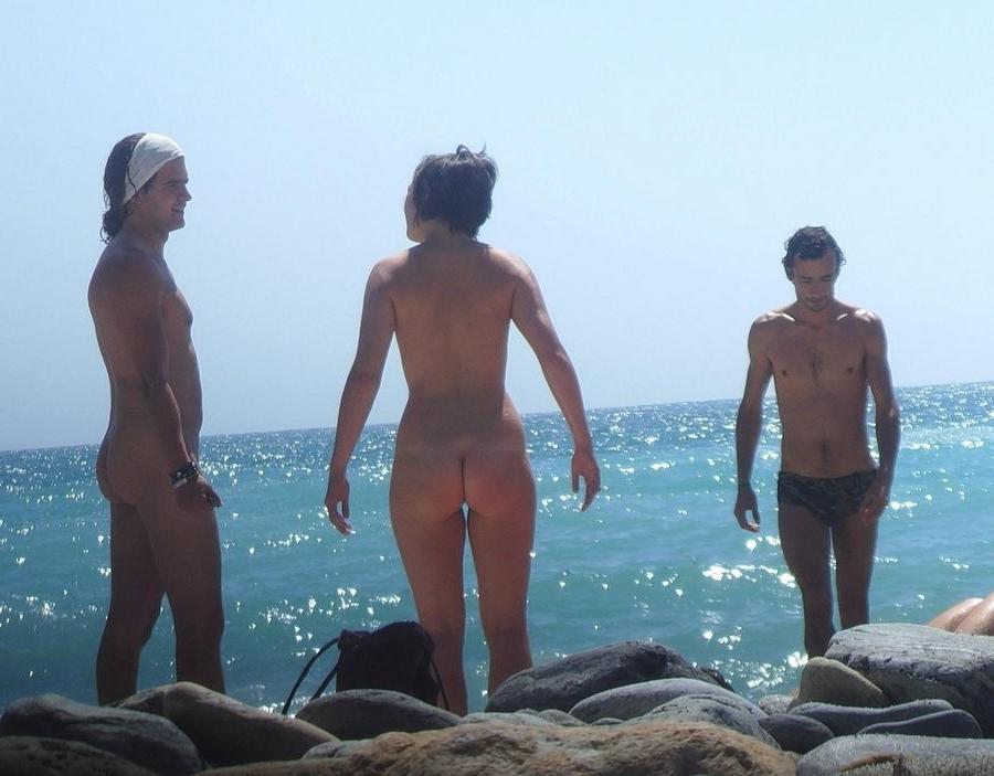 15P Barely legal nudist babe lights up at the beach