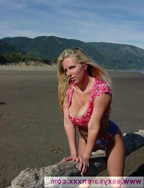 16P Karen Fisher Stripping At The Beach