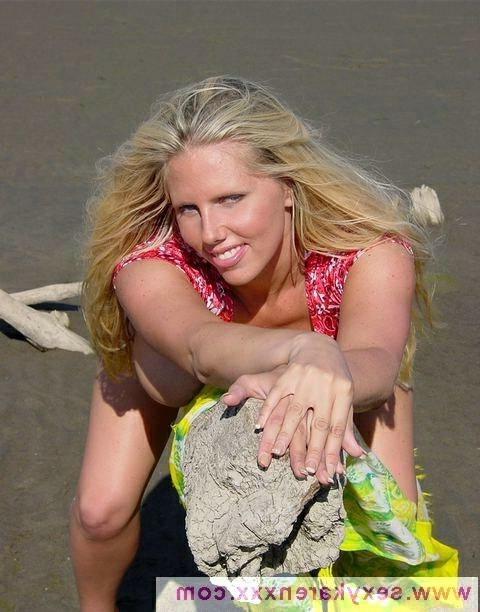 16P Karen Fisher Stripping At The Beach
