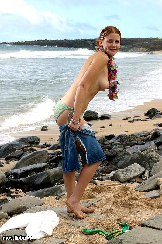 16P Hot sexy girl poses in and out of her bikini on the public beach
