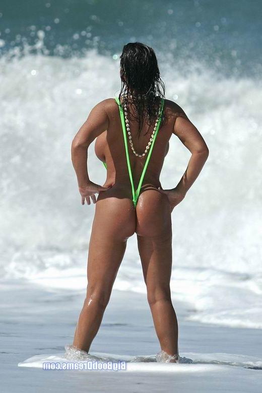 16P Sexy babe with big tits posing at the beach in bikini