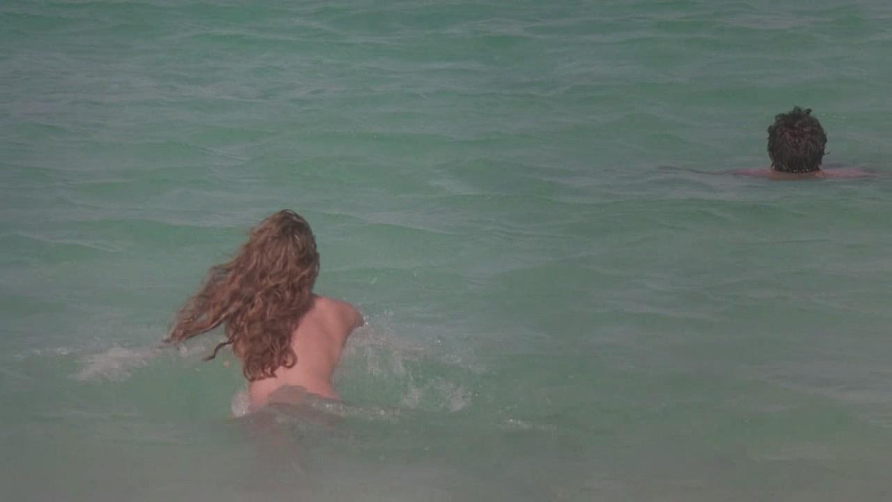16P Hot actress Kelly Brook nude on a beach