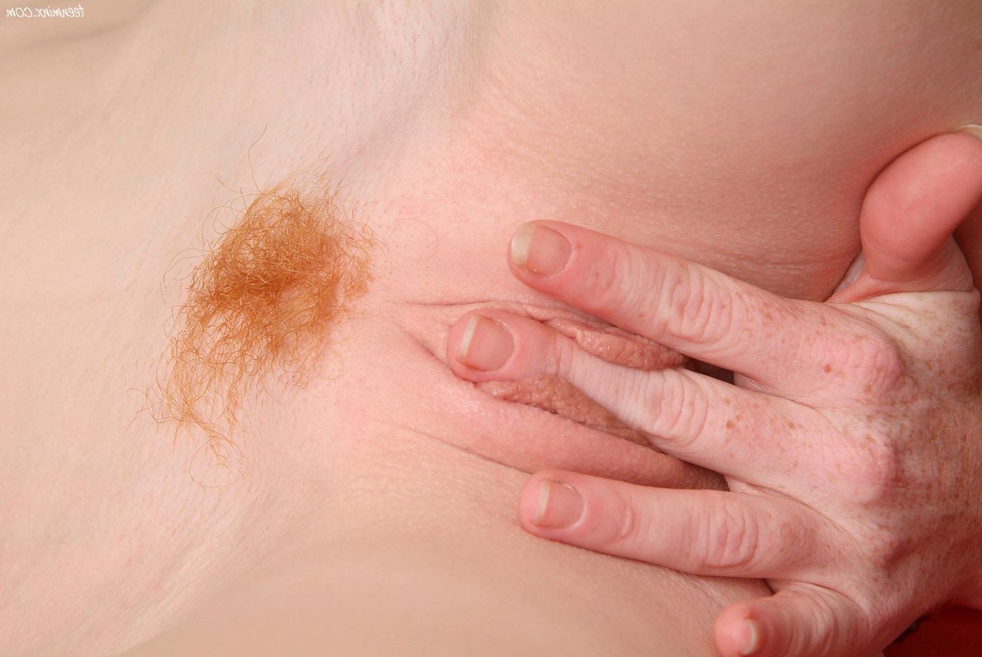 18P Freckled petite redhead beauty spreads her perfect little pussy