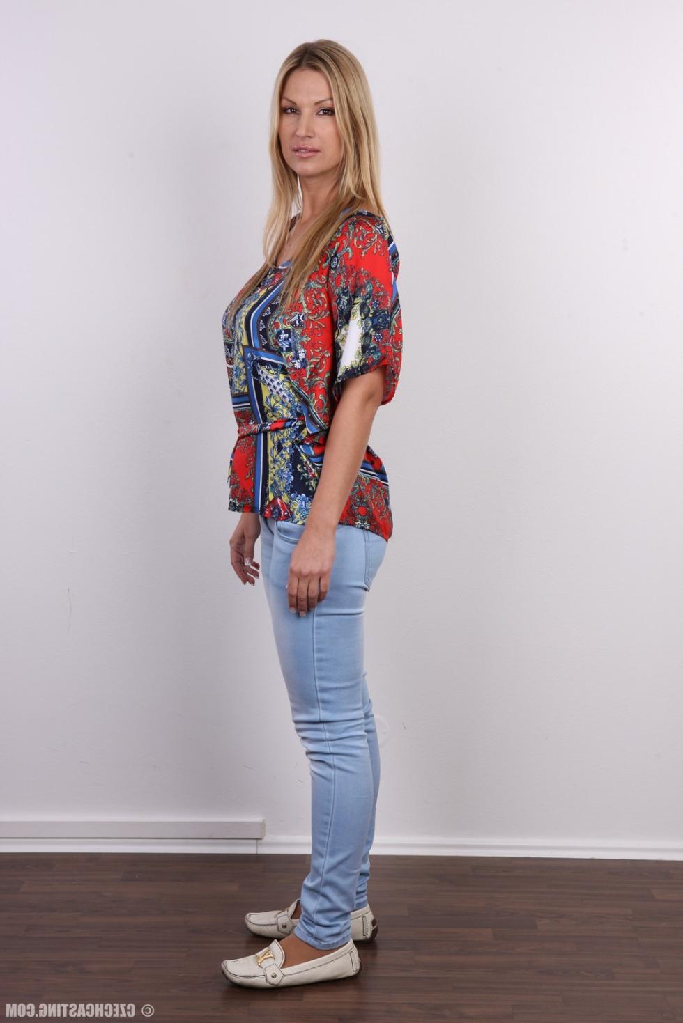 15P Busty blonde wife poses