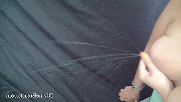 15P Busty amateur babe Linda squirts milk from giant boobs