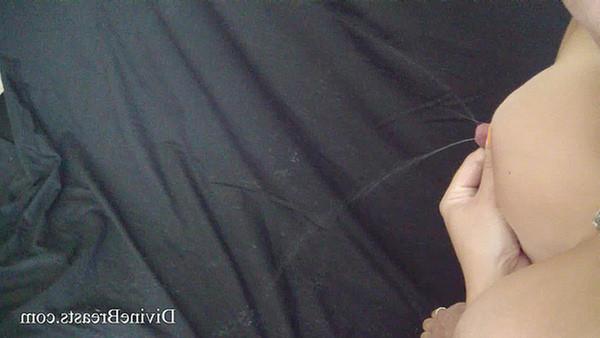 15P Busty amateur babe Linda squirts milk from giant boobs
