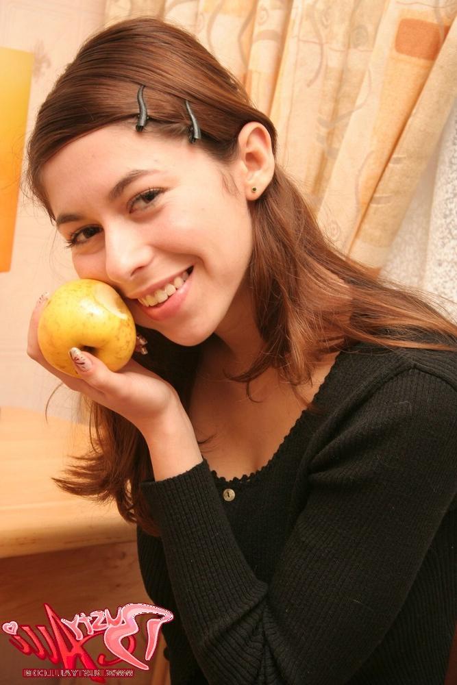 15P Busty Alli shows her Melons while playing with apples
