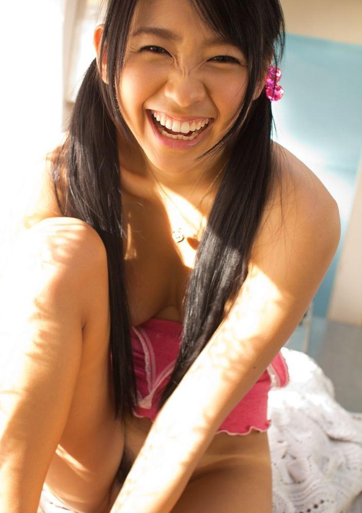 15P Slim and busty asian Nana Ogura posing in pink outfit