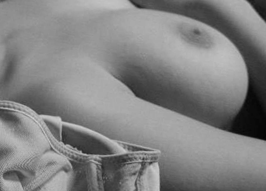 15P Pictures of a busty amateur chick in black and white