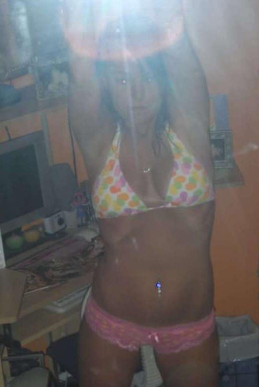 15P Picture compilation of a chick exposing her round breasts