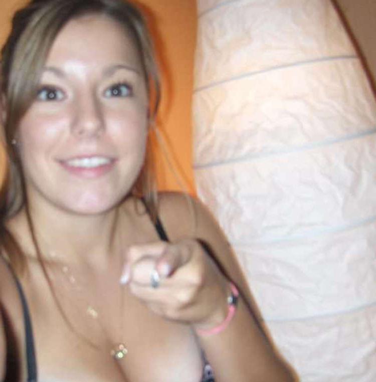 15P Picture compilation of a chick exposing her round breasts