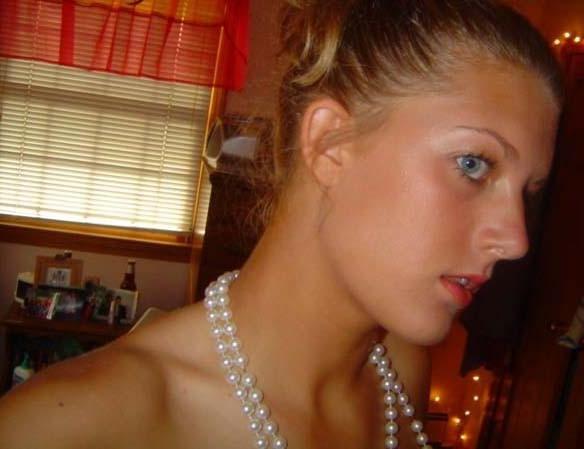 15P Blue eyed chick displays her huge tits