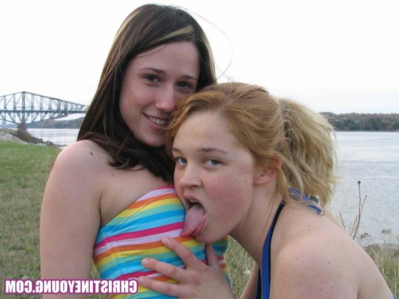 15P Two young lesbians teasing and having good fun by the water