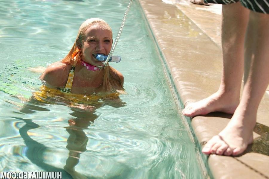 16P Addison Cain put on a chain by her guy in a pool