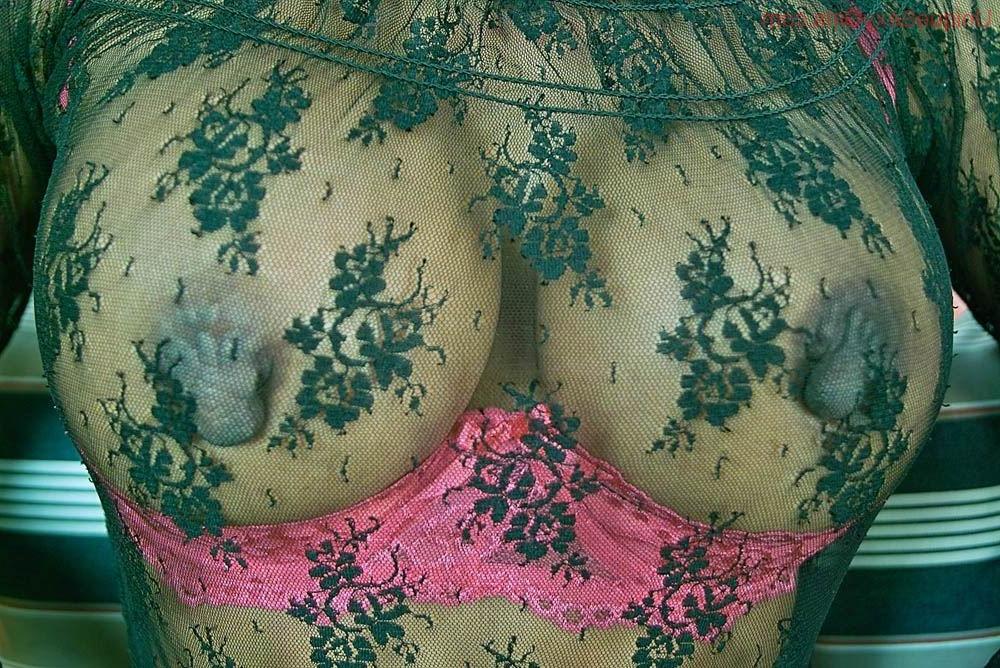 16P Woman playing with her huge erect nipples